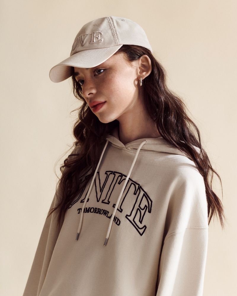 TML COLLEGE CURVED CAP WASHED OFF WHITE